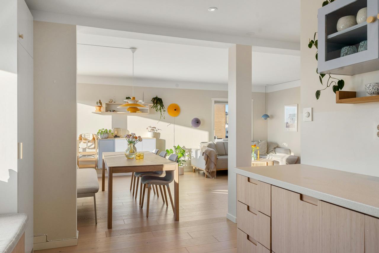 A large open kitchen with a dining room table