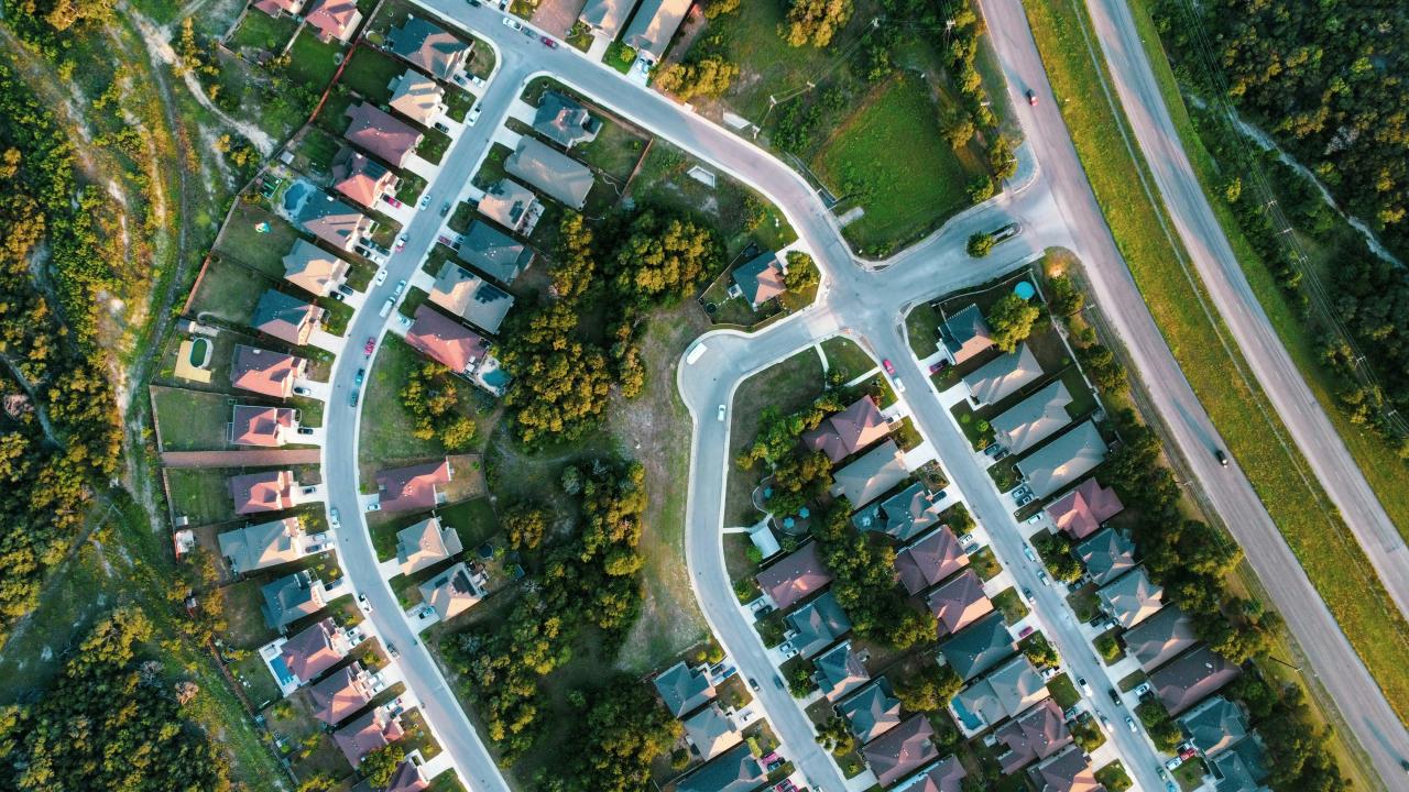 Aerial view of a suburban neighborhood with winding streets.